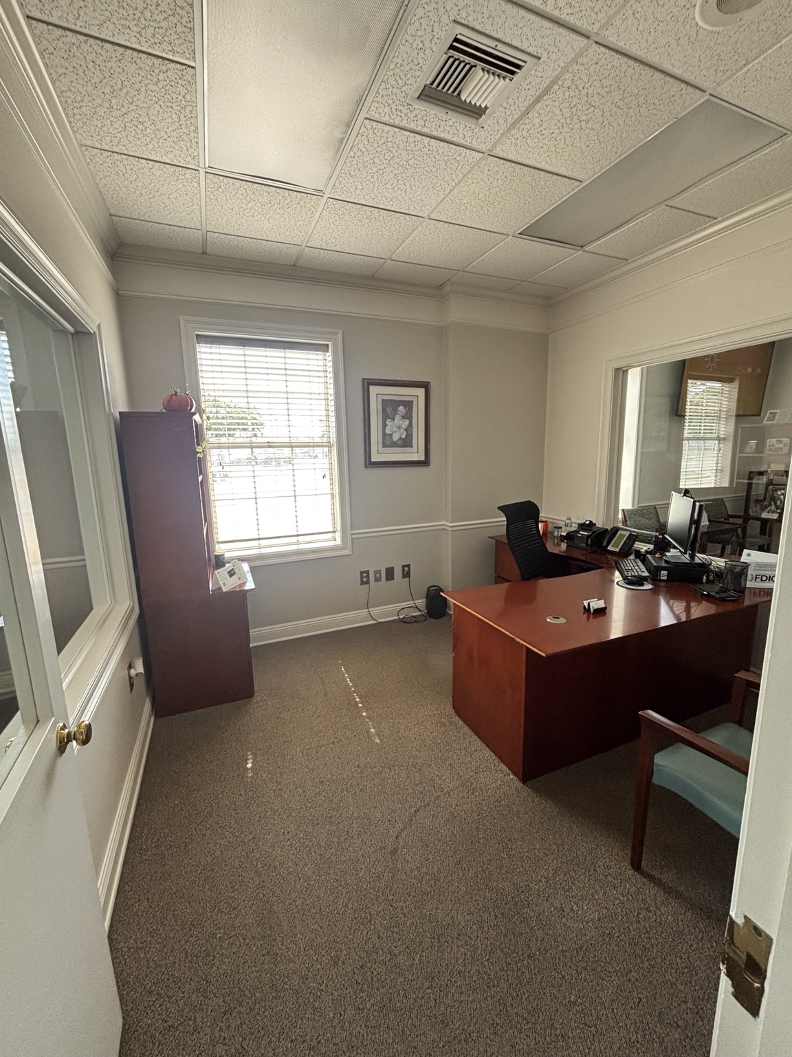 Freshly painted Hancock Whitney office walls and trim