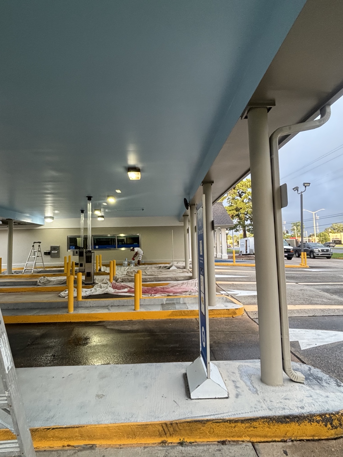 Freshly coated bank drive-through canopy ceiling